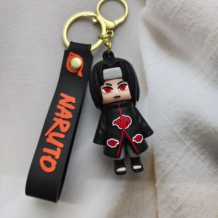 Keychain with a character from 'Naruto' on a strap with 'Naruto' branding.